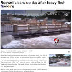 A screen capture from a news article showing flood waters over-topping a bridge.